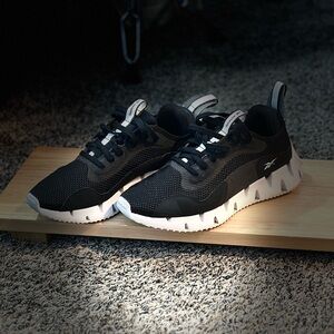 Reebok black and white sneakers